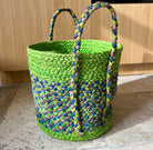 Corbeille en raphia rond, esthétique et artisanale, parfaite pour un usage quotidien.