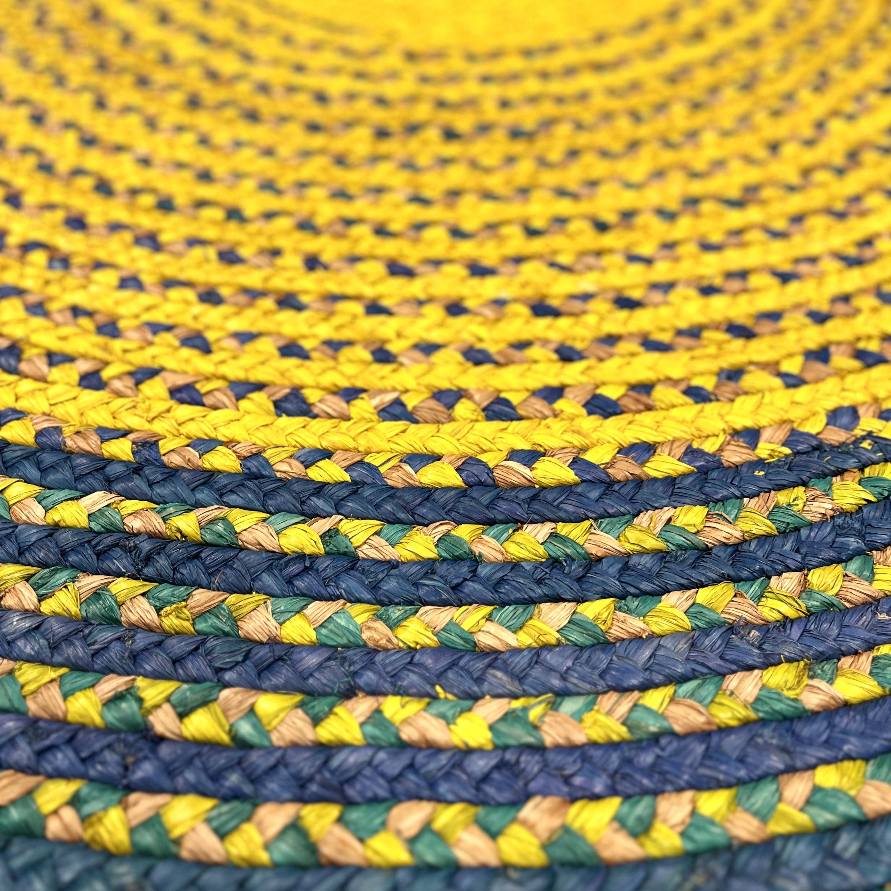 Tapis en raphia rond jaune et bleu – 170 cm