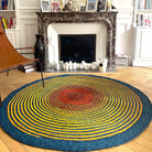 Tapis rond en raphia bleu, jaune et rouge - Blandine - 170 cm Intimani Ethnique chic