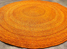 Tapis rond en raphia orange- Yvette- 190 cm Intimani Ethnique chic